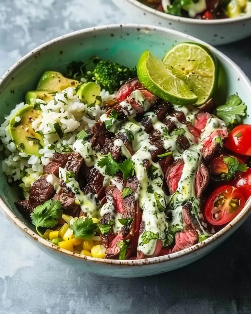 Cilantro lime steak bowl with fresh ingredients and garnish