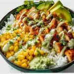 Delicious Street Corn Chicken Rice Bowl topped with spices and fresh ingredients