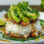 Delicious Honey Lime Chicken served with avocado rice stack.