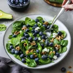 Healthy spinach blueberry salad with vibrant colors and fresh ingredients
