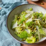 Fresh asparagus salad with colorful vegetables and dressing