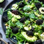 Colorful Blackberry Avocado Salad with arugula and fresh ingredients