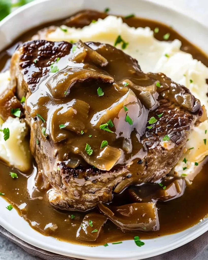 Delicious Crock Pot Cube Steak with Gravy served on a plate