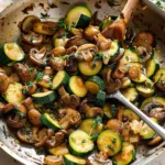 Skillet zucchini and mushrooms sautéed with herbs and spices