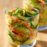 Creamy Asian cucumber salad with fresh vegetables and tasty dressing