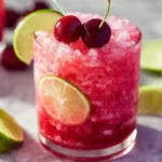 Delicious honey sweetened fresh cherry limeade beverage in a glass