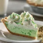 Delicious Shamrock Shake Pie with mint cream filling and whipped topping