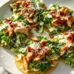 Smash Chicken Caesar Tacos with chicken, lettuce, and Caesar dressing in tortillas
